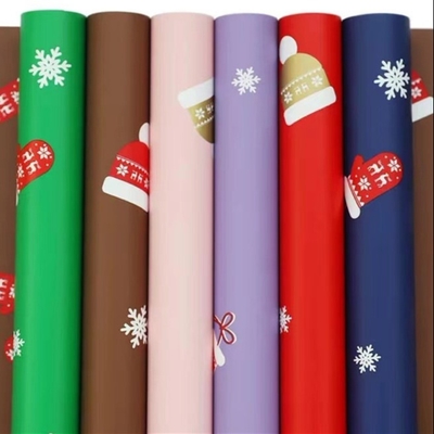 Harga yang bagus Kertas Pembungkus Bunga Kado Natal 58cm X 58cm 20 Lembar Dalam Tas on line