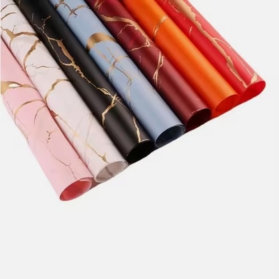 Beli grosir emas marmer bunga bungkus kertas tahan air bahan bunga bungkus hadiah online manufacture