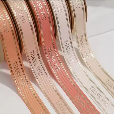 Beli Ribbon bermerek poliester emas dengan logo 3D untuk Natal dan ulang tahun online manufacture