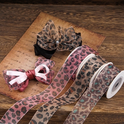 Beli Leopard cetak salju pita DIY buatan tangan busur rambut aksesoris tenunan pita jerami topi tali sepatu membuat aksesoris kotak hadiah kemasan pita online manufacture