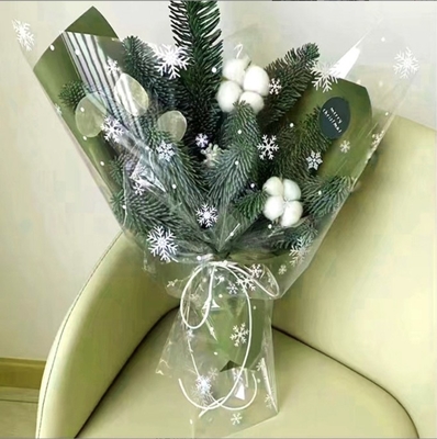 Beli Toko bunga selophane serpihan salju tahan air Natal, karangan bunga malam Natal, hadiah, pabrik kemasan apel grosir dan penjualan langsung online manufacture