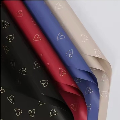 Harga yang bagus 20PCS Cinta hati pencetakan kertas tahan air bungkus bunga Bunga bungkus kertas on line