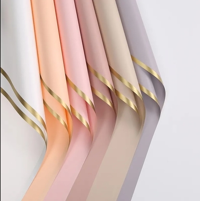 Harga yang bagus 2024 Gold Edge Plastic Flower Wrapping Paper Multicolor Waterproof Tepak untuk Bunga Segar on line