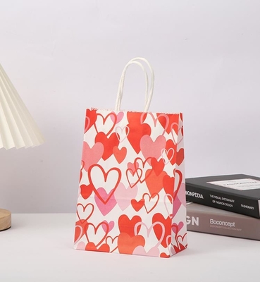 Harga yang bagus Tas Hadiah Kertas Kraft Merah 80gsm Love Heart Printed Kertas Goodie Bags With Handles on line